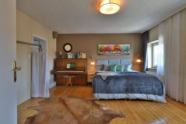 Schlafzimmer mit Dielenboden