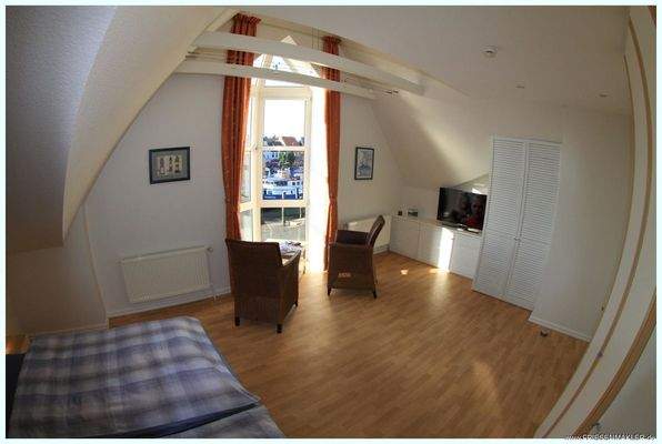 Schlafzimmer mit Hafenblick