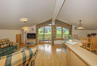 KITZIMMO-Dachgeschosswohnung mit Kaiserblick - Immobilien Aurach.