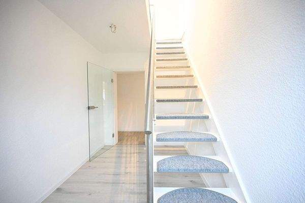 Treppe zur oberen Ebene