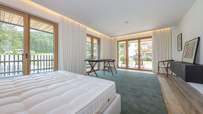 KITZIMMO-Riverside - Luxus-Garden-Suite in Toplage kaufen - Immobilien Kirchberg.