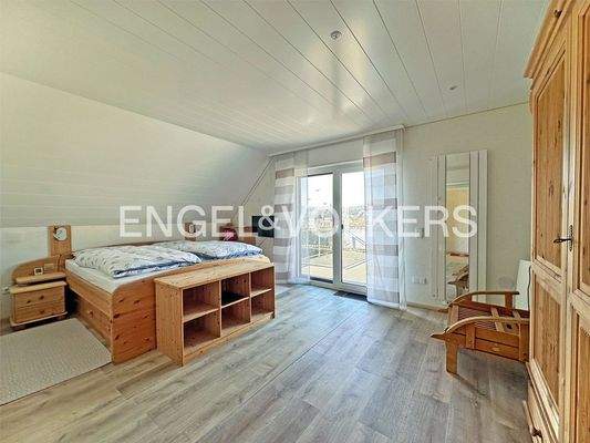 Schlafzimmer mit Balkonzugang