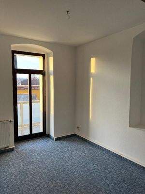 Schlafzimmer mit Balkonzugang