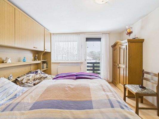Schlafzimmer mit Balkonzugang