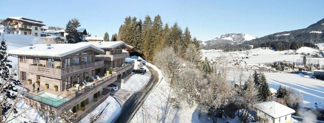 Zwei trendige Chalets in Toplage