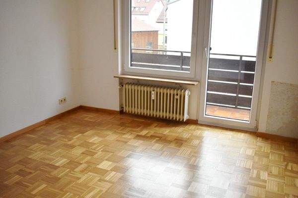 Schlafzimmer mit Zugang zum Balkon