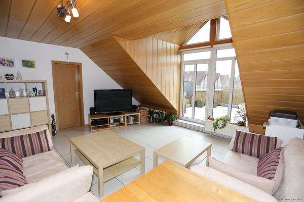 Wohnbereich mit Ausgang auf die Dachterrasse