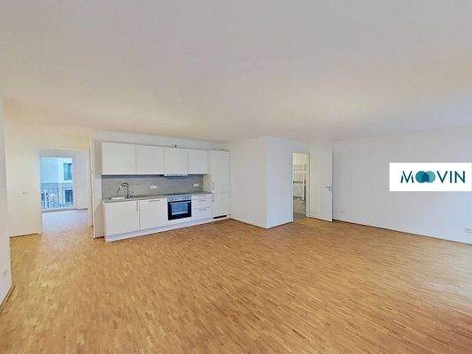 Ansicht V: Wohn- und Esszimmer mit offenem Küchenbereich