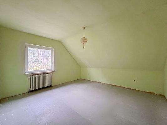 Wohnung DG Schlafzimmer