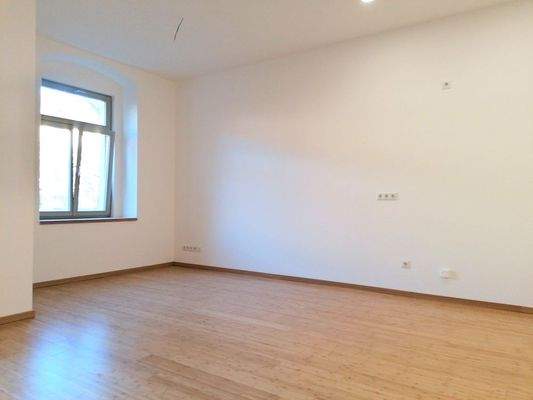 Wohnzimmer mit Fußbodenheizung