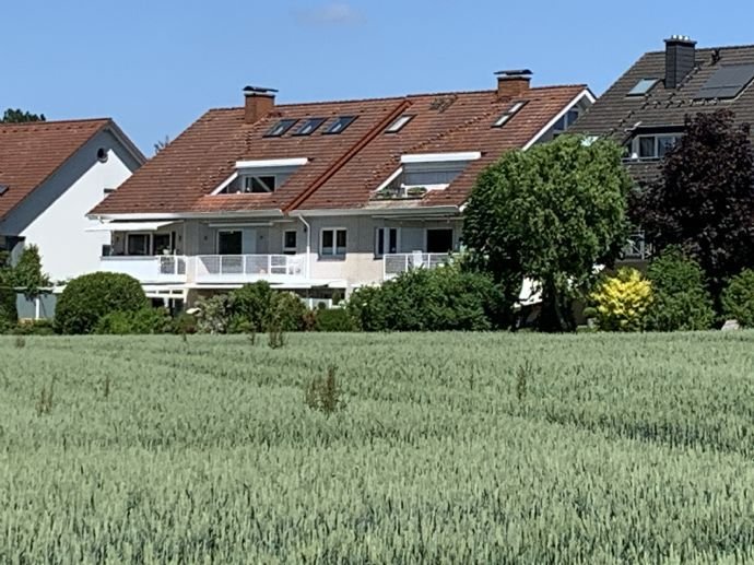 Über den Dächern von Hoberge: Charmante 4-Zi.-Maisonette-ETW mit Loggia und Traumausblick