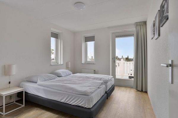 Schlafzimmer Villa Cape Helius Arbeitsplatz Balkon Zugang Yachthafen Hellevoetsluis04