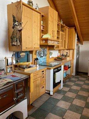 Vollholzküche mit Wamslerherd 