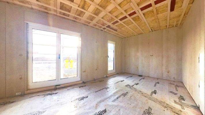 Offene Grundrissgestaltung: Wohn- und Essbereich mit nahtlosem Übergang zur Küche