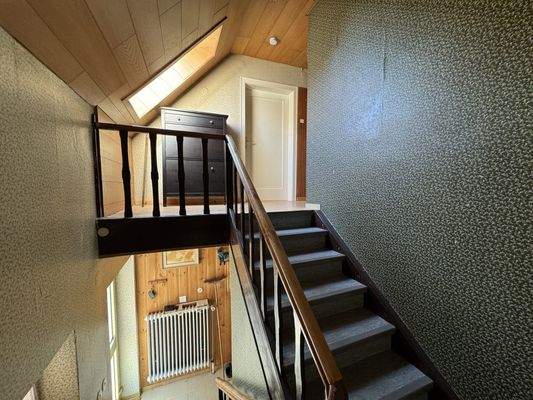 Treppenaufgang ins Obergeschoss