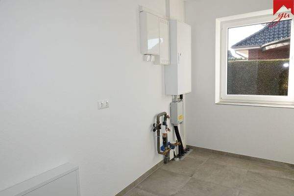 Hauswirtschaftsraum mit Waschmaschinenanschluss