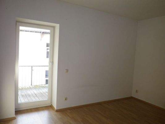 Schlafzimmer mit Ausgang zum Balkon