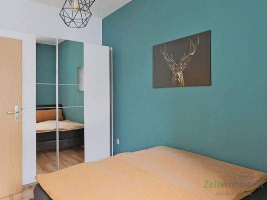 verspiegelter Kleiderschrank