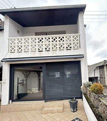 Terrassenausgang (halb geschlossen) und Balkon 