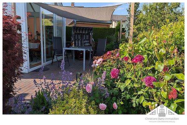 Wintergarten mit Sonnensegel