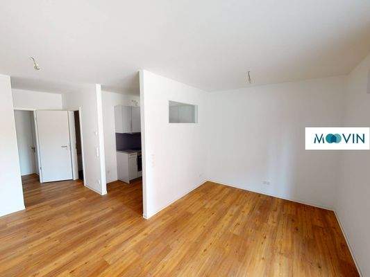 Ansicht II: Wohn- und Schlafzimmer mit offenem Küchenbereich