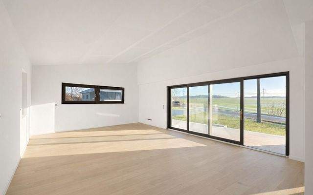 Wohnzimmer Visualisierung nach Maler-/Bodenbelagsarbeiten