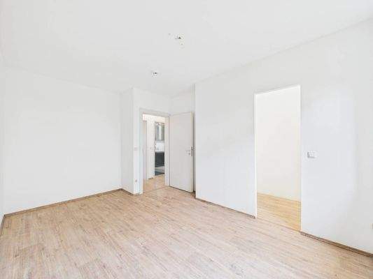 Schlafzimmer mit begehbarem Kleiderschrank