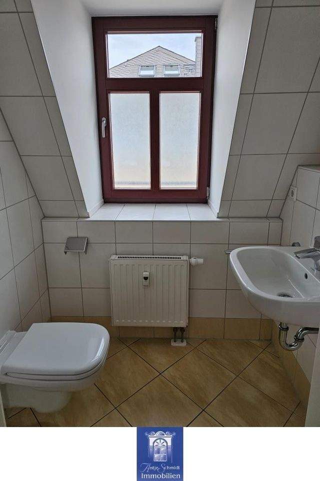 Beeindruckende Dachwohnung mit großer Küche und optimaler Raumaufteilung! - Foto 1