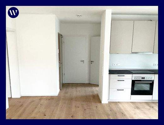 Wohnen/Blick in Flur und Küche