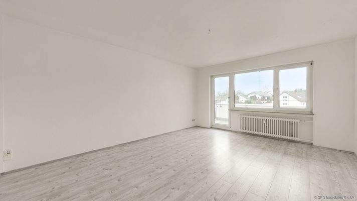 Wohnzimmer mit Balkonzugang