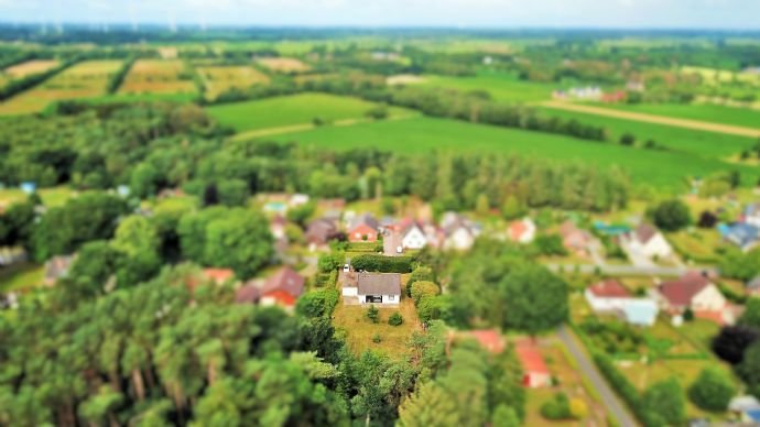 günstiges Einfamilienhaus mit 2.421 m² Grundstück in Waldrandlage mit Garage + Ausbaureserve