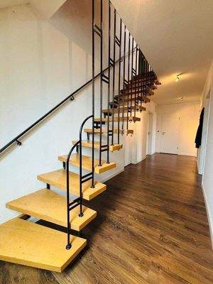 Treppenaufgang ins Obergeschoss