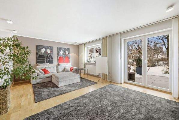 Wohnzimmer mit Zugang zur Terrasse