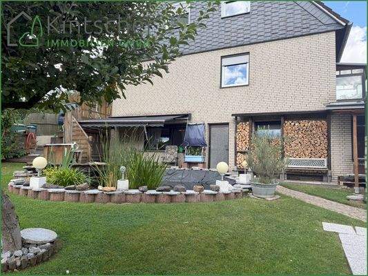 Blick vom Garten auf den separaten Wohnbereich