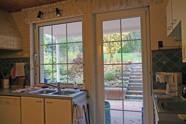 Küche mit Zugang zum garten