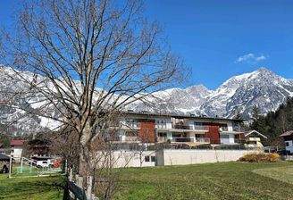 Ansicht Wohnhaus im Süden, Schöne 3-Zimmerwohnung mit Stellplatz, Scheffau