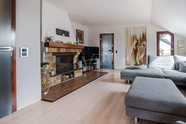 Charmanter Wohnbereich mit Kamin