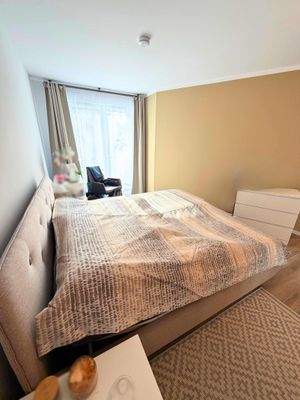 Schlafzimmer mit Balkonzugang