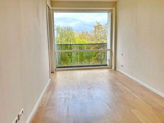 Schlafzimmer mit Blick ins Grüne