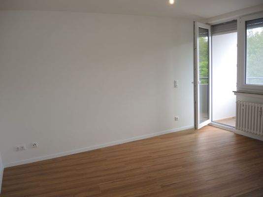 Schlafzimmer mit Balkonzugang