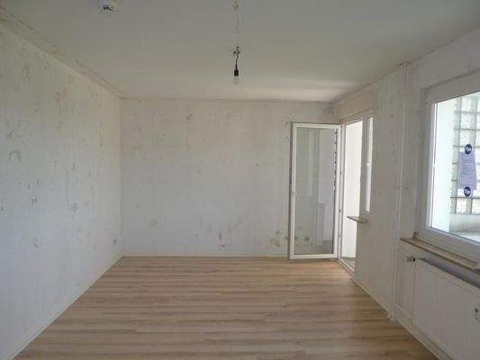 Wohnzimmer mit Balkon