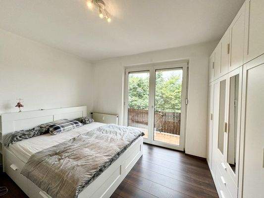 Schlafzimmer mit Balkon