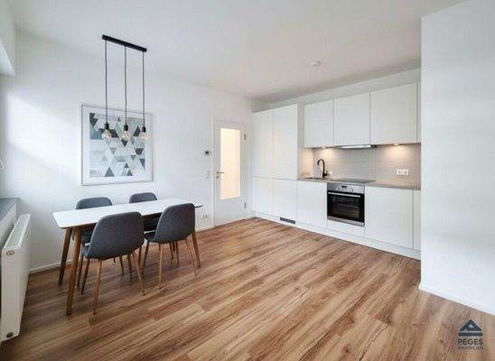 Wohnzimmer mit Kochbereich - Möbel und Dekoration KI-generiert