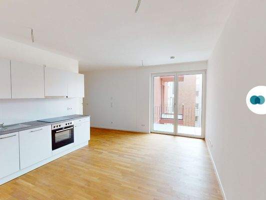 Ansicht II: Wohn- und Esszimmer mit offenem Küchenbereich