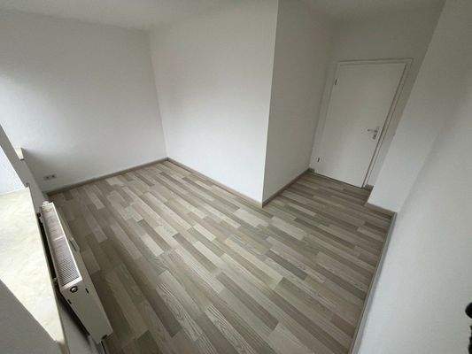 Leeres Zimmer mit Holzboden