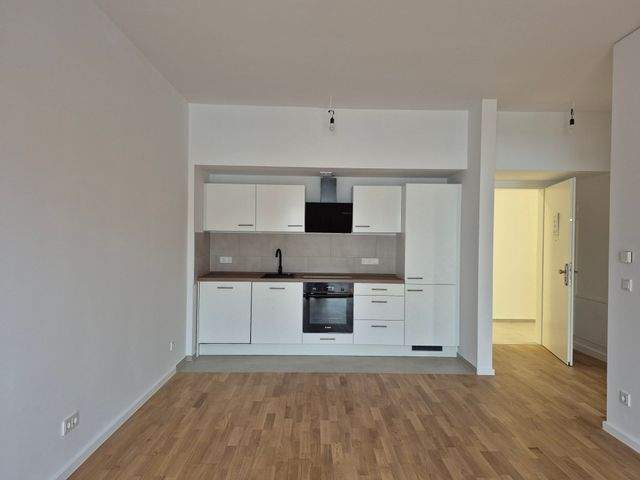 Schicke 2-Zimmer mit Parkett, Balkon, Einbauküche, Fußbodenheizung u. Stellplatz - Photo 3