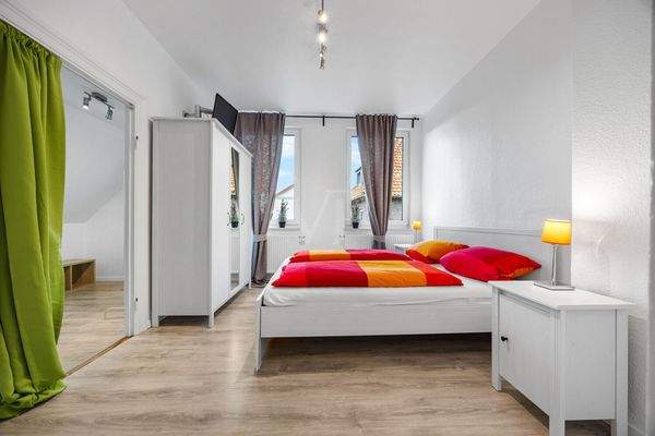 Das Schlafzimmer Wohnung 1 im Obergeschoss