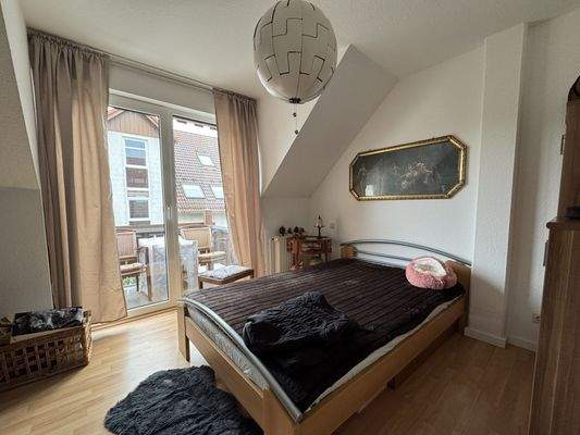 Schlafzimmer mit Balkonzugang