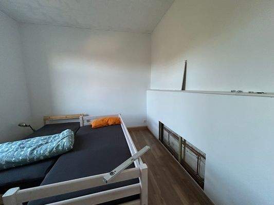 Schlafzimmer mit Betten