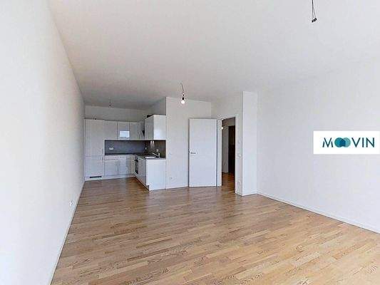 Ansicht IV: Wohn- und Esszimmer mit offenem Küchenbereich